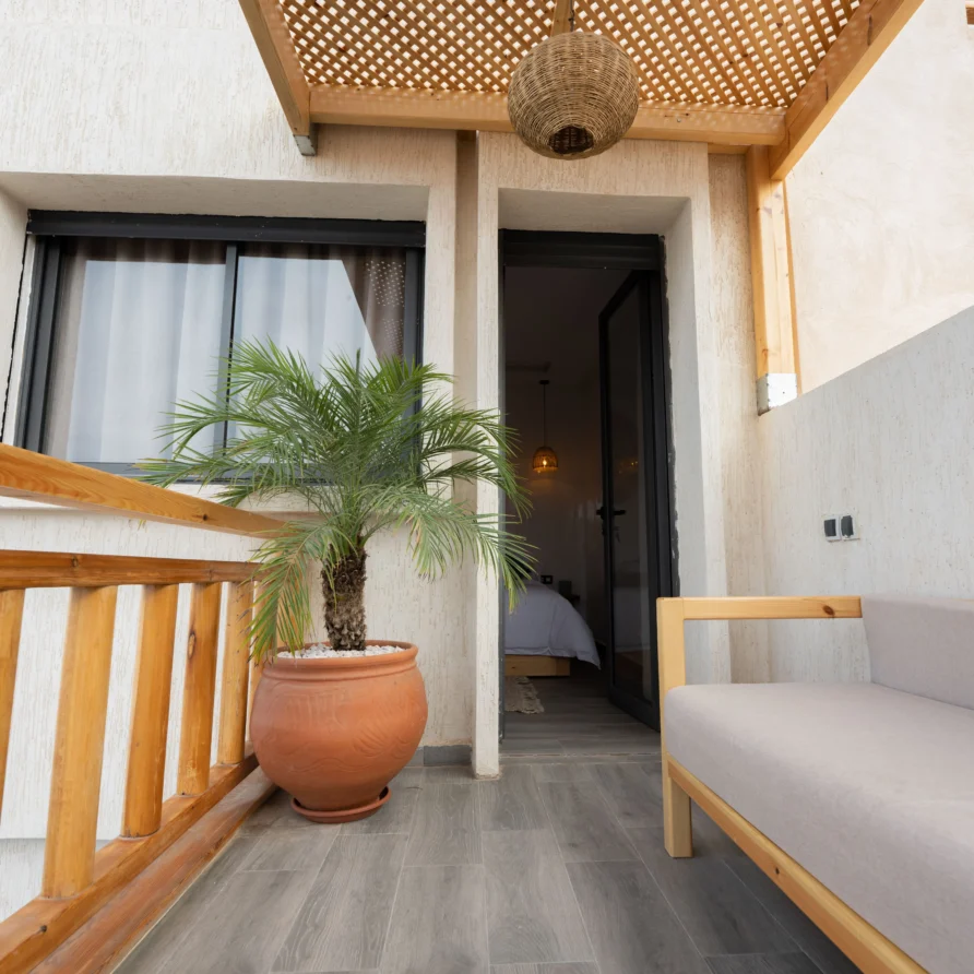 Deluxe surf camp room with balcony and sea view in Imsouane