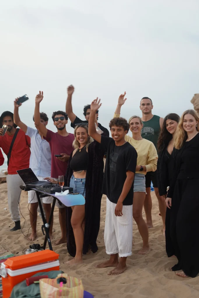 team and client after surf happy maroc