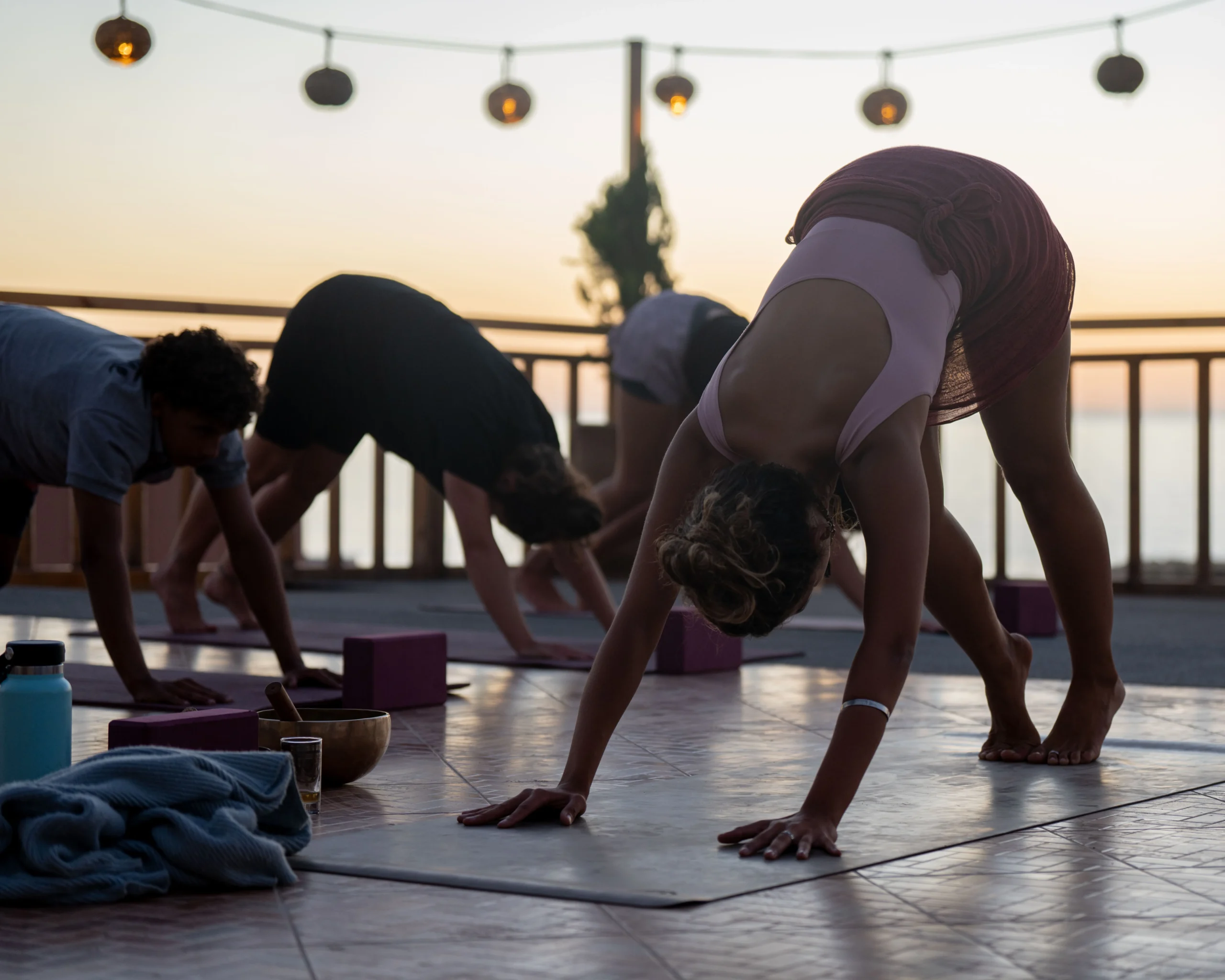 sunset yoga on terrace of residence imsouane surf camp