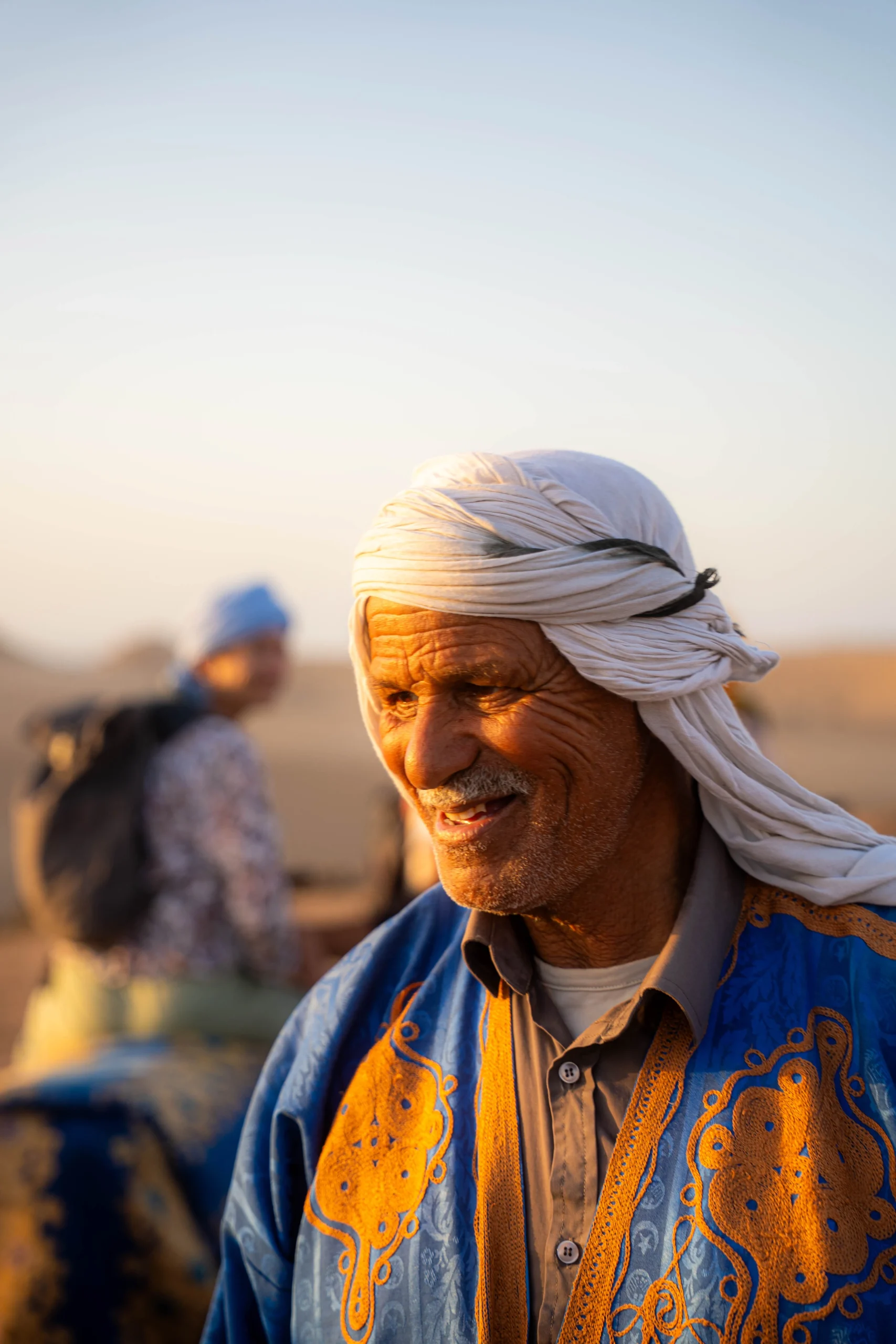 old moroccan man smilling after timlaline trip with surf camp imaouane